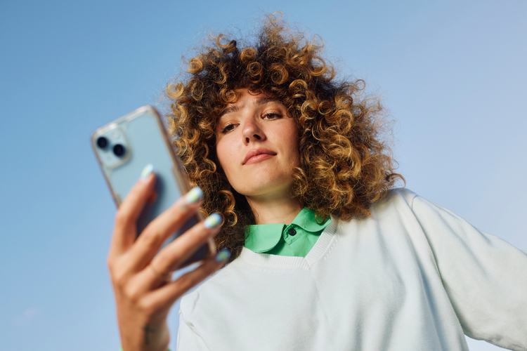 Girl holding her phone