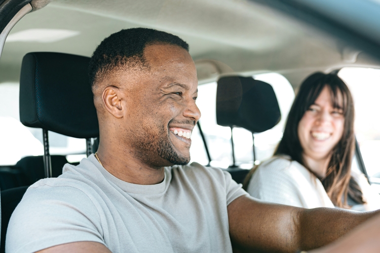 Happy couple in a car