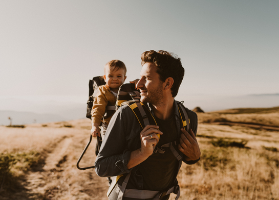 dad takes his baby for a hike