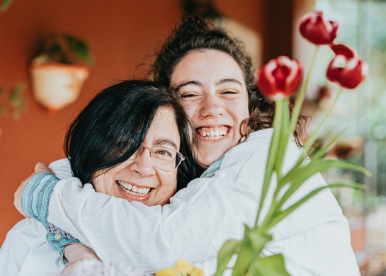 Mother and daughter garden together