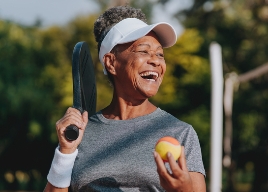 Woman plays pickleball