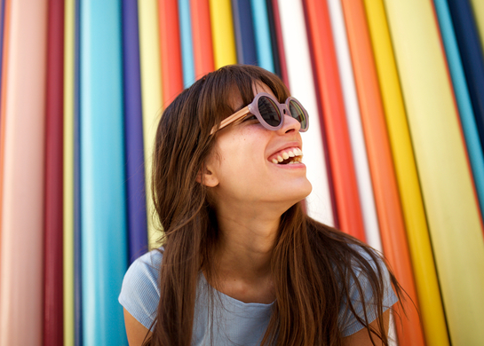 young woman wearing lilac sunglasses