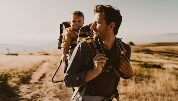 dad takes his baby for a hike