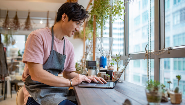 Man working in a coffee shop.