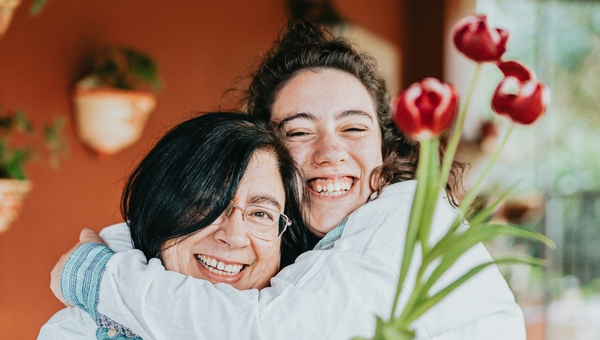 Mother and daughter garden together