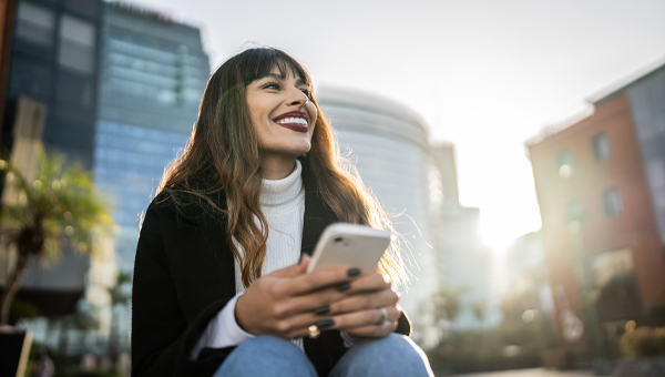 woman laughing outdoors