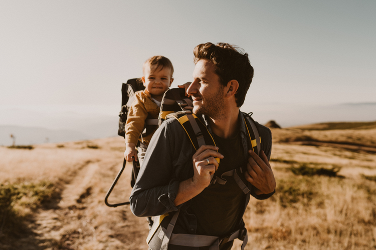dad takes his baby for a hike