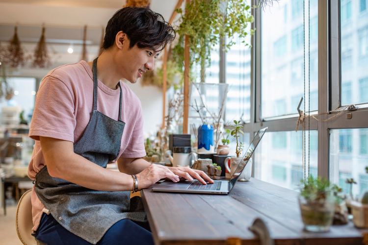 Man working in a coffee shop.