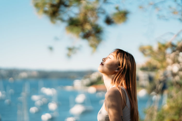 woman outdoors in sunlight