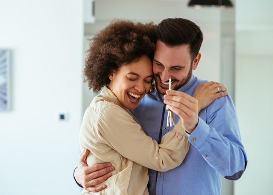 Couple gets keys to new home