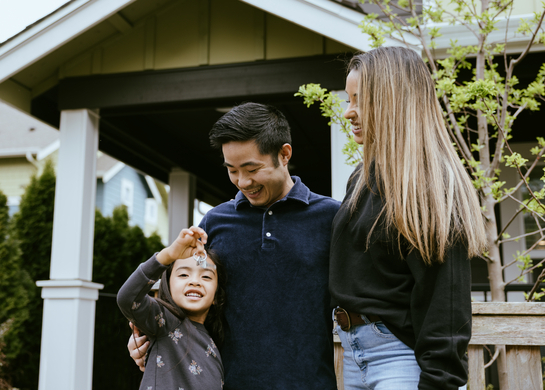 Family gets the keys for new home.