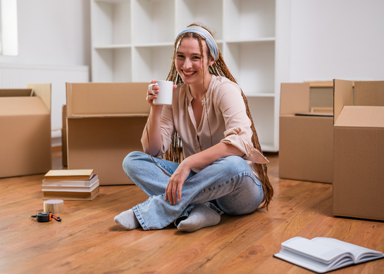 Woman moving into new apartment