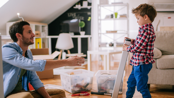 Son helps dad build furniture
