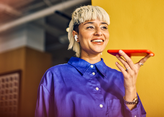 Woman using phone hands free.