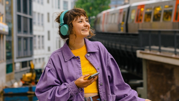Girl listening to music outside