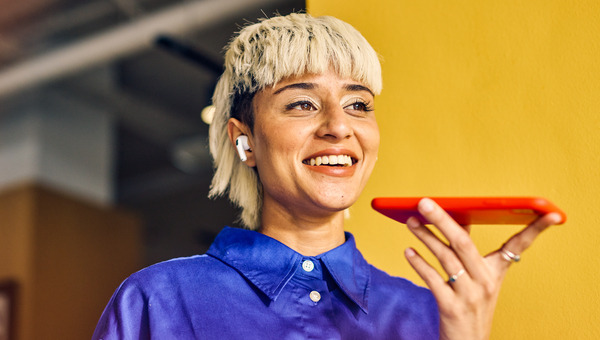Woman using phone hands free.