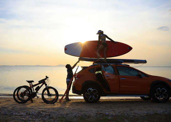 Couple at the beach after sporting activities