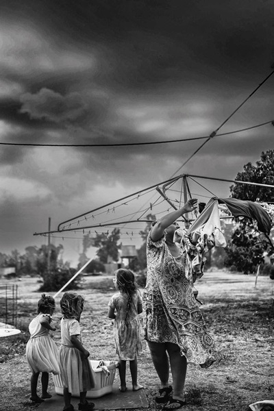 “Motherhood Against the Elements” by Jypsie Cronan.